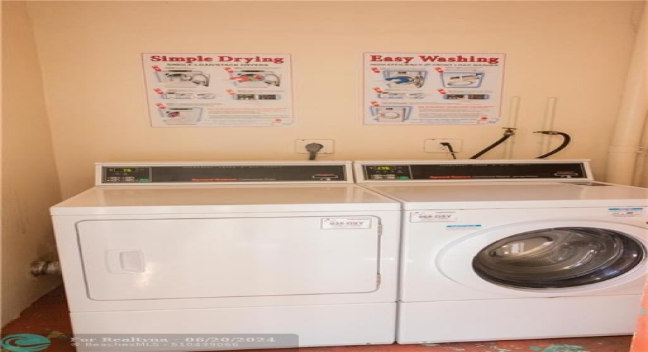 card operated washer and dryer across from the unit