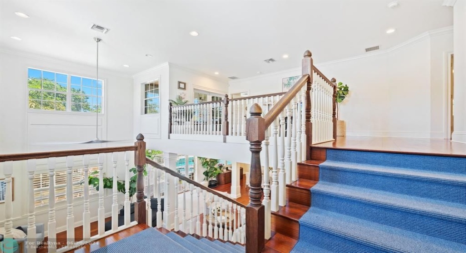 The beautiful staircase is a wonderful feature of the home