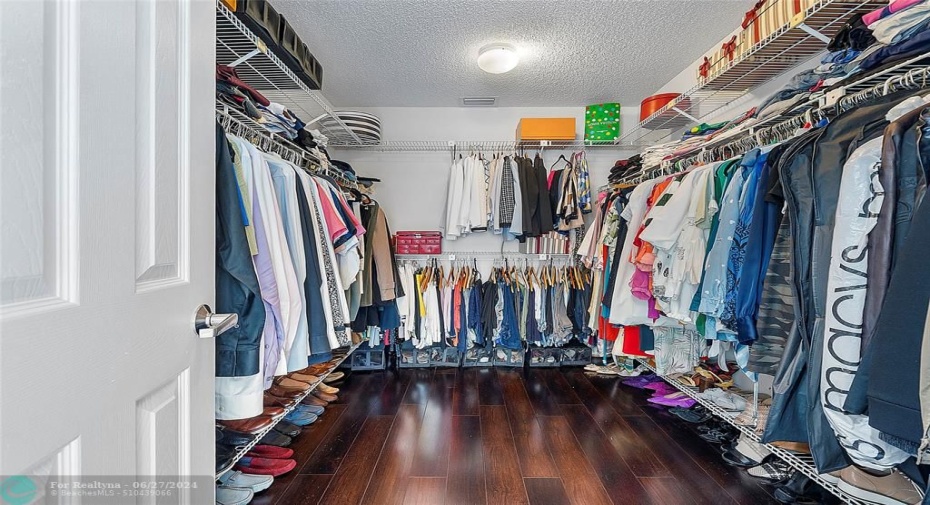 Large walk-in closet off of primary bathroom