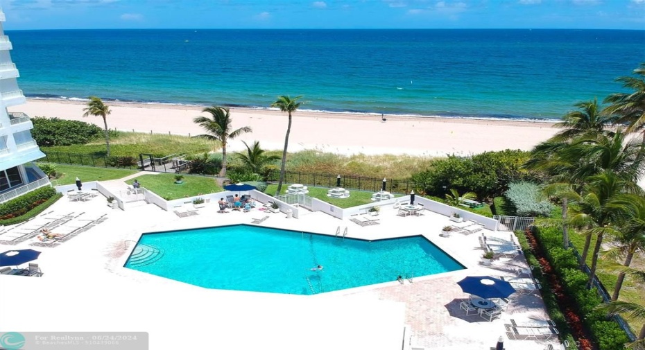 Enjoy relaxing at the pool located right on the beach and private beach access