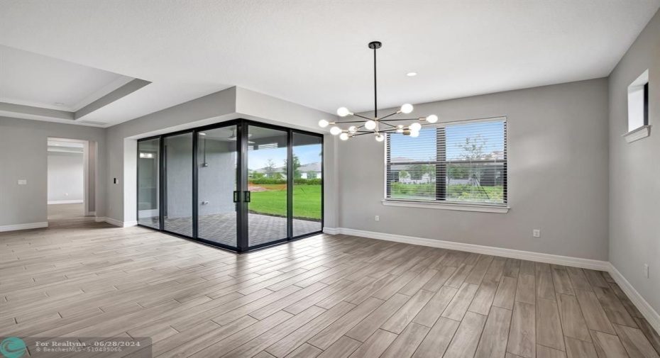 Dining room with corner glass doors