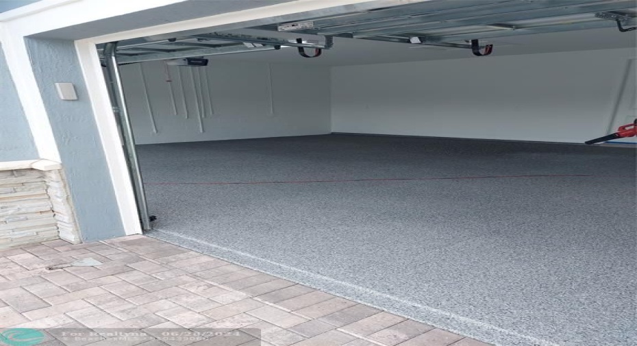 Over sized 3 car garage with professional Epoxy coating