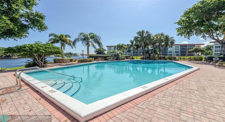 Community pool is located right on the water is the perfect place to swim and sunbathe