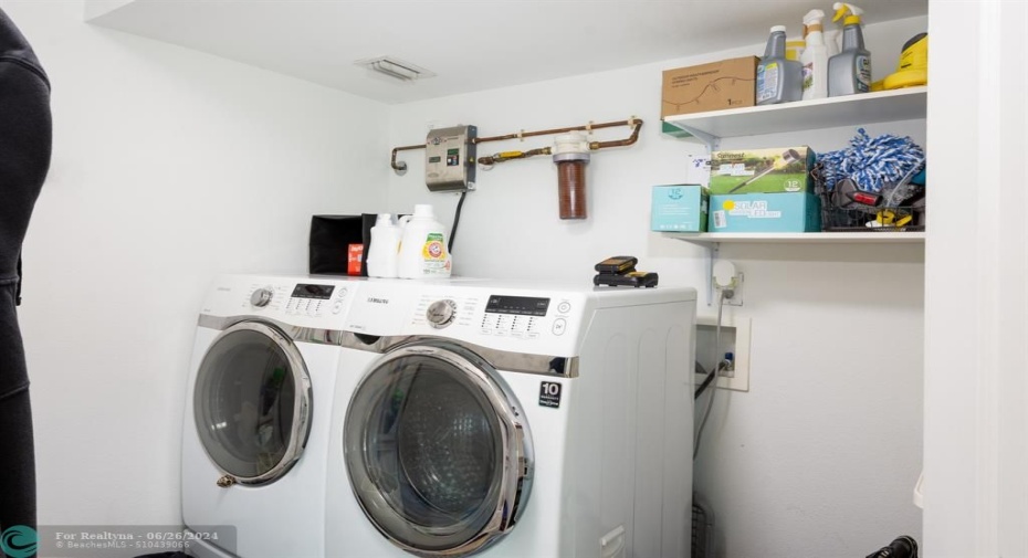 laundry with the filtered instant hot water heater