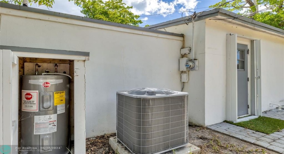 AC Condenser and Hot Water Heater shed