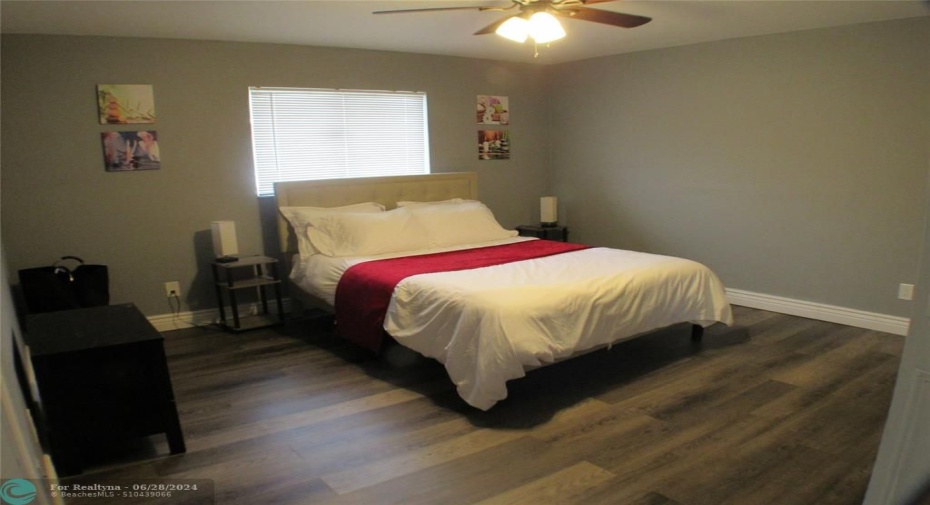 UNIT A INCLUDES BED, BEDDING, NIGHT STANDS AND DRESSER