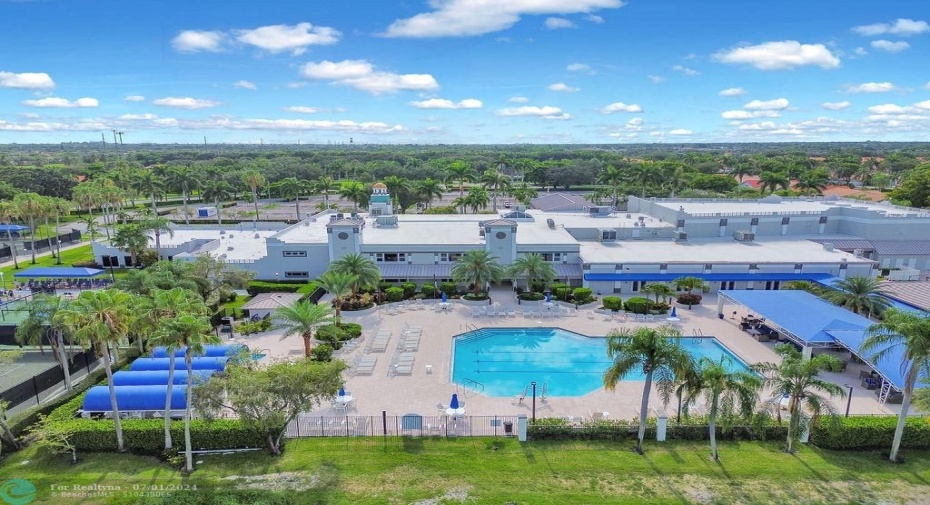 Huge main pool has extensive patios & seating.