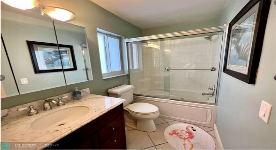 Bathroom with shower and tub