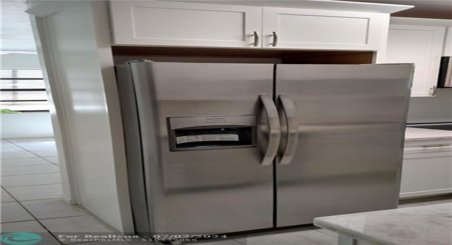 Brand new stainless  side by side refrigerator with water and ice maker.