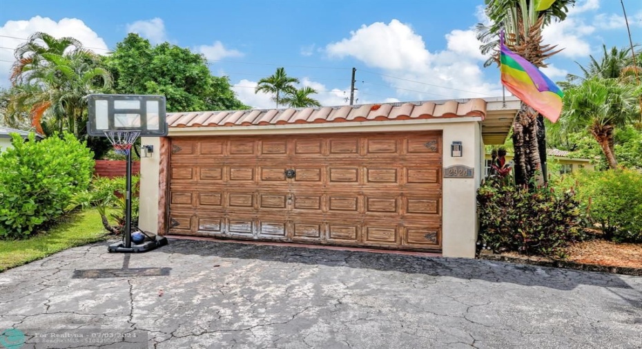 2 car garage with large driveway with additional parking space!