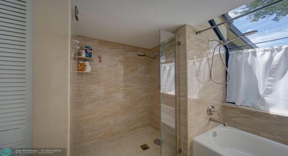 Master shower with new tile.