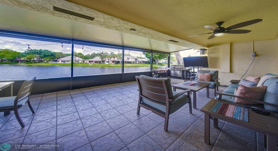 Wow!  Enjoy the Florida lifestyle on this huge roofed and screened patio!