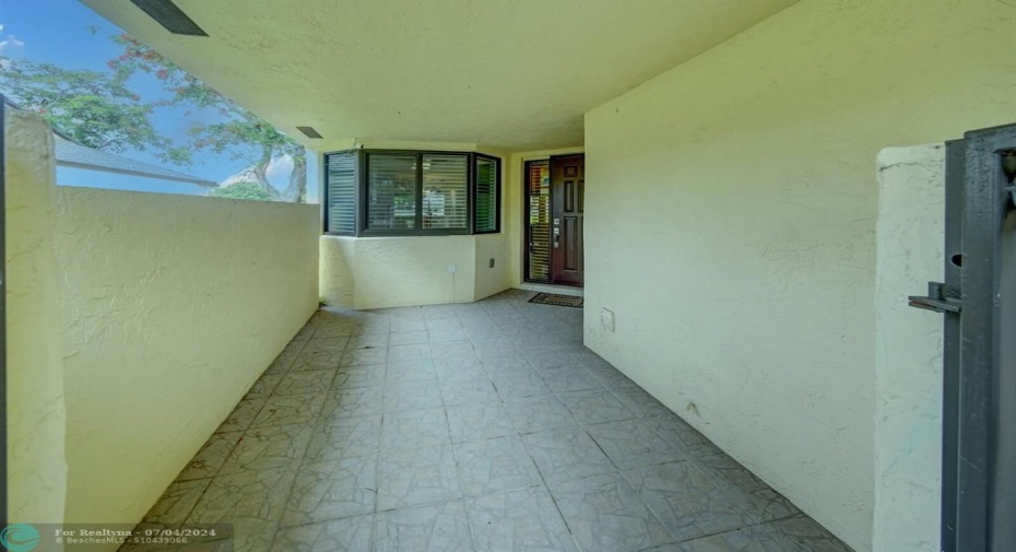 Tiled and covered entryway