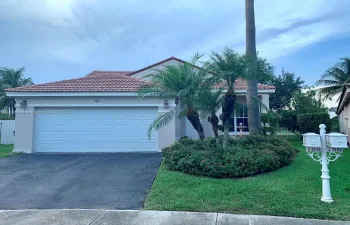 Beautiful curb appeal with landscaped palm trees at Cul-de-sac lot