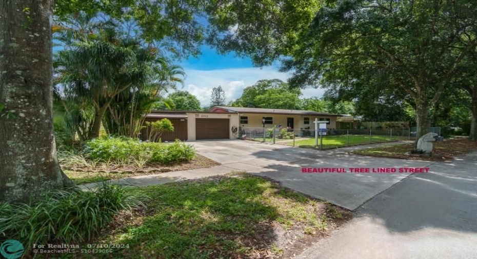 Home is located on a Tree lined street with sidewalks.