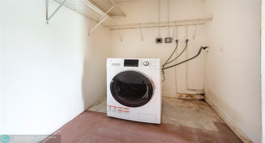 Combo Washer/Dryer unit in Garage