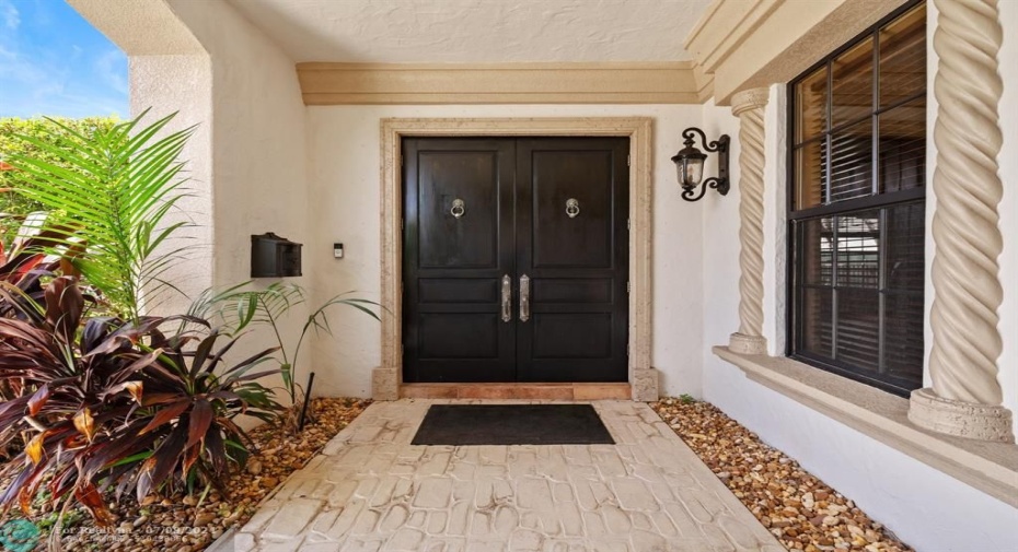 Inviting and impressive double door entry