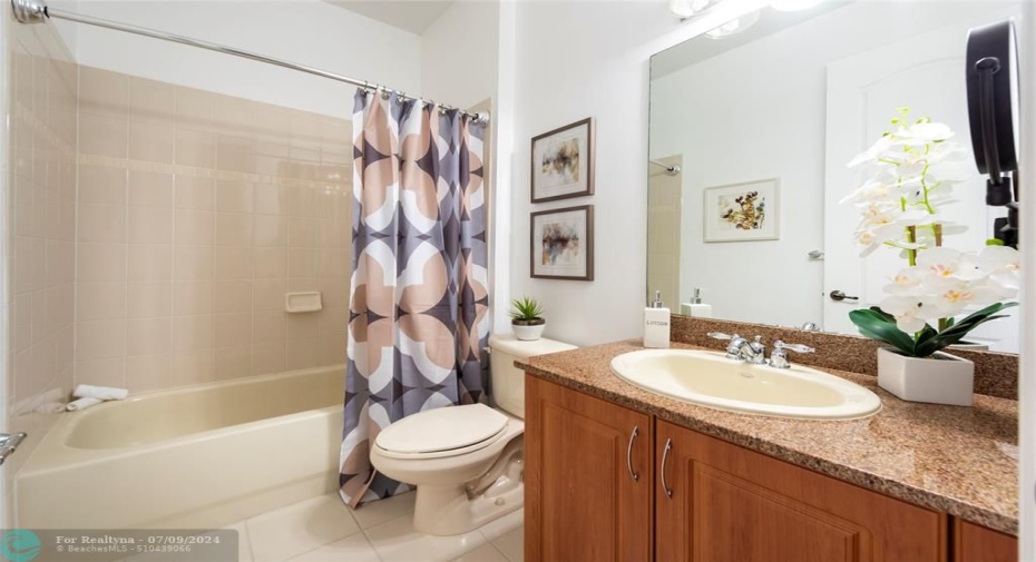 This 2nd Floor Guest bathroom is Bright and Modern, Has a Tub with Shower and is Conveniently Located for Family and Guests