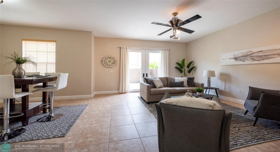 This Family Room is Bright and Spacious and Open Floor Plan to the Dining Room Area convenient for Entertaining!