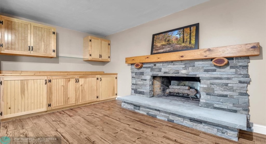 The showstopper of the room is your amazing, updated fireplace. Makes this room a definite hang out spot for all the game, movie and boardgame nights
