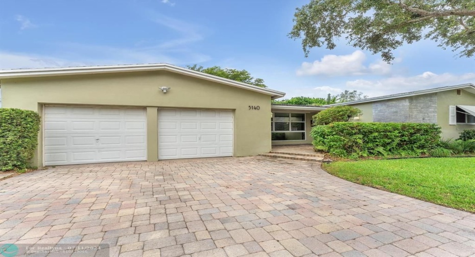 2 car garage with plenty of storage space and plenty of guest parking in front of the garage