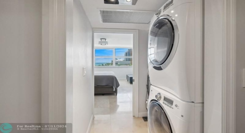 Laundry room inside owners suite