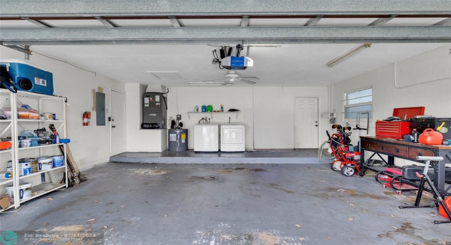 2 car garage with newer washer dryer