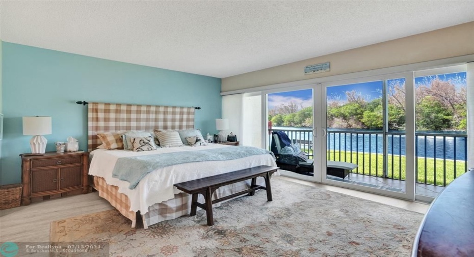 Large bedroom with beautiful water view