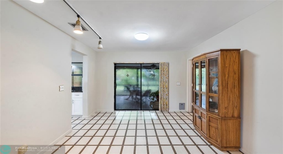 Dining Area Slider leading to screen enclosed Patio