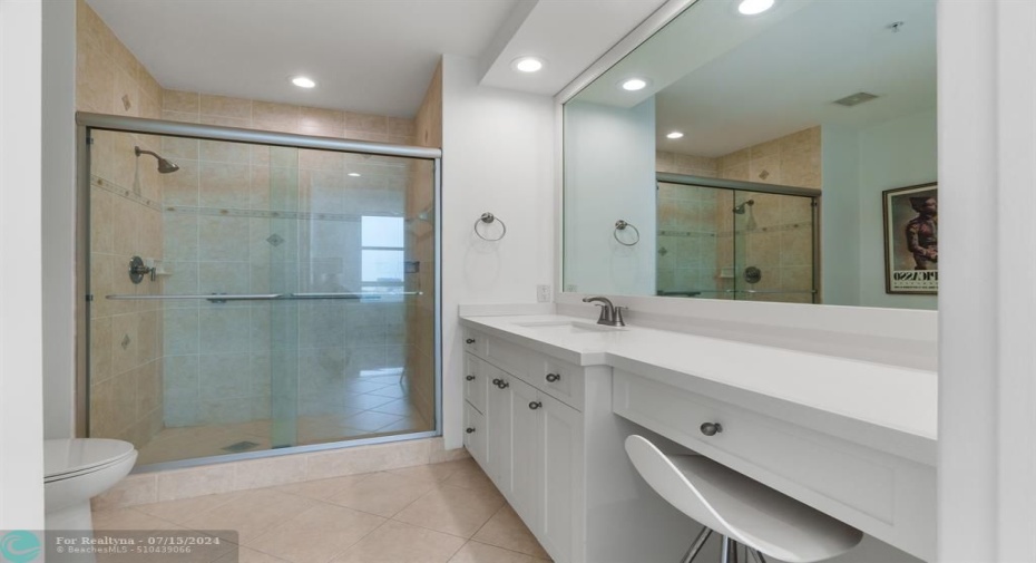 walk-in shower - white modern cabinetry and quartz countertops