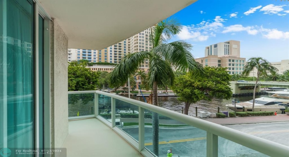 Enjoy fabulous tropical River & sunset views from the balcony off of the Master Bedroom