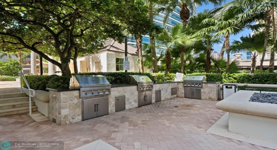 Barbecue grills on pool deck