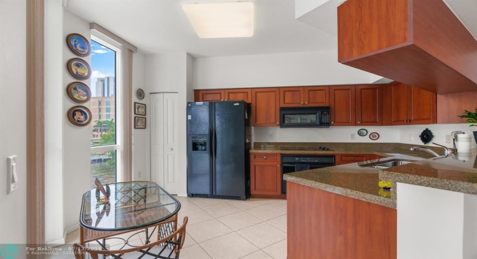 Spacious eat-in kitchen with access to the balcony