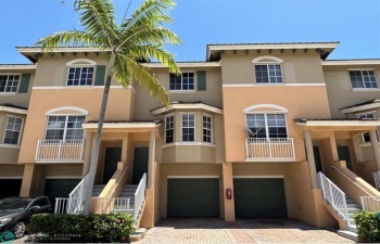 Tri Level Townhouse with 1 Car Garage + 1 Driveway Parking