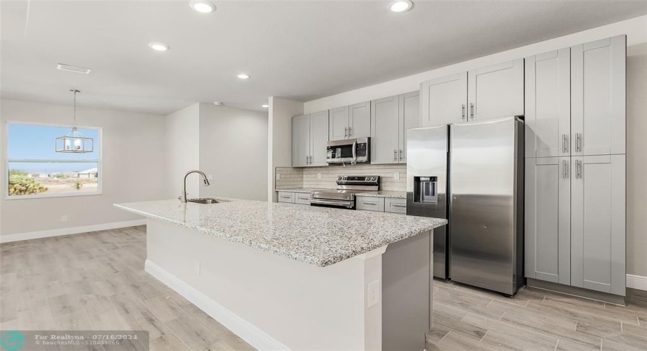 Kitchen with Dinning room area.