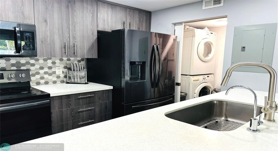 Large Washer Dryer in unit.