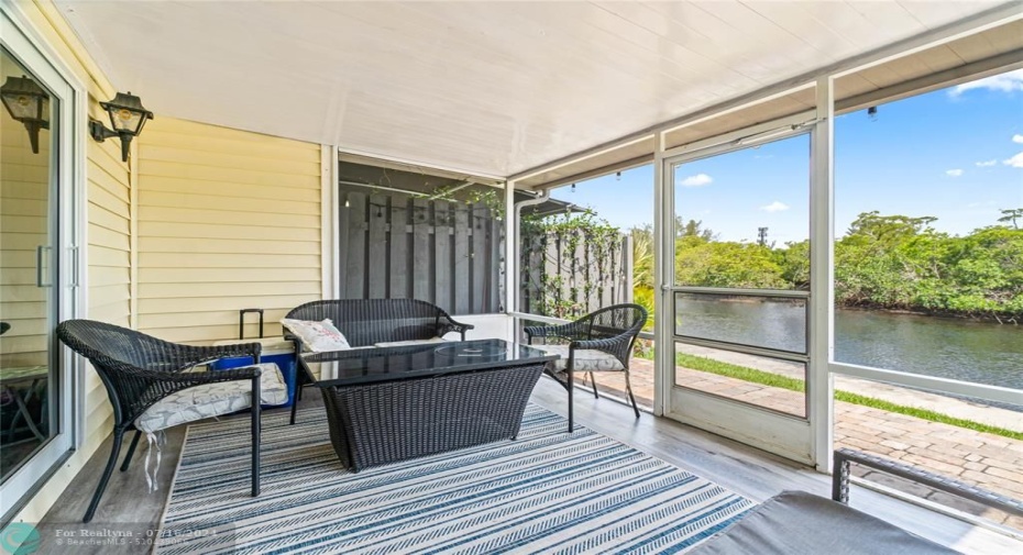 Screened Room with peaceful views, watch the kayakers & Manatees swim by