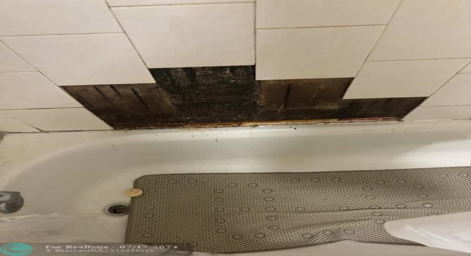 Water damage in Hall bath tile broke off