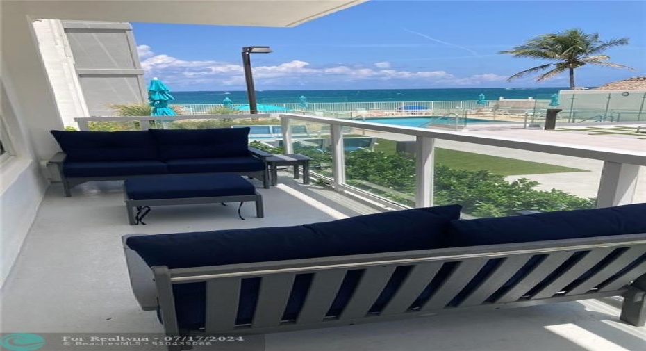 Your Balcony overlooking the Pool, Ocean & BBQ Patio Area