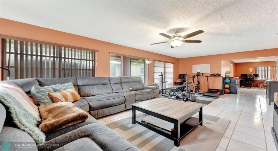 Part of this room could easily be converted to a 3rd bedroom with 1 wall, a door, and some additional outlets.