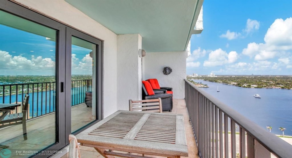 Intracoastal and lake view from the large balcony that accommodates two separate sitting areas and more!