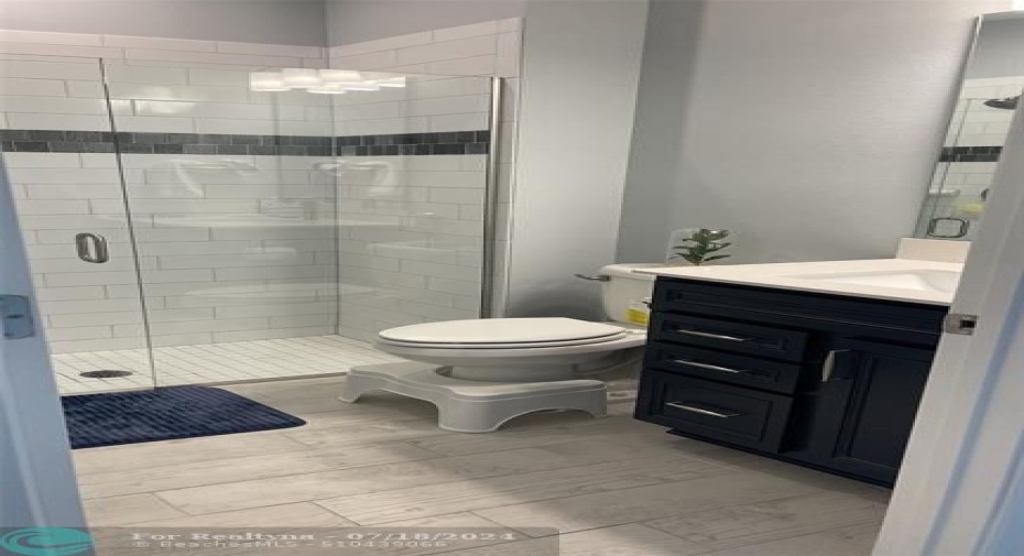 Shower Stall in Bathroom o=in Main Floor