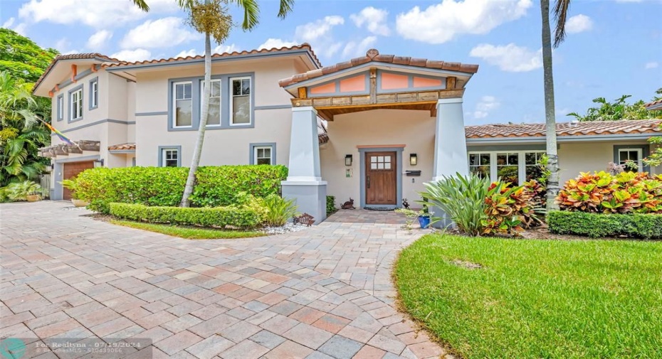 Large Craftsman-style home in a tropical setting