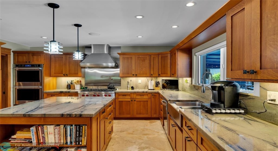Magnificent Appointments: Custom Wood Cabinets, Special Granite, Wolf stove and hoof