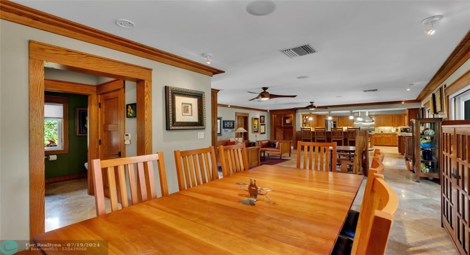 Dining Room with a view of the Kitchen in the Background