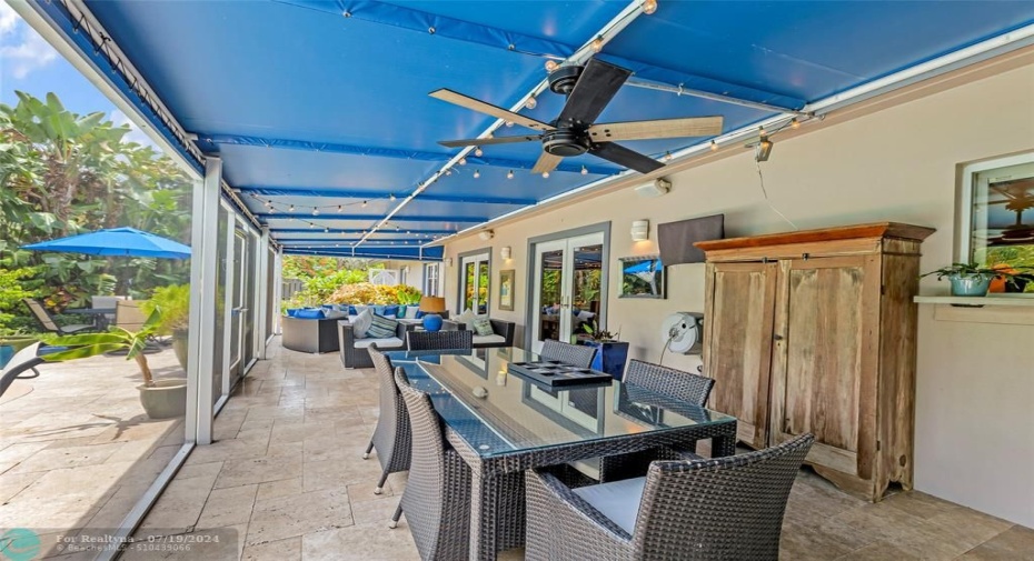 Outdoor Dining and Living in screened room.