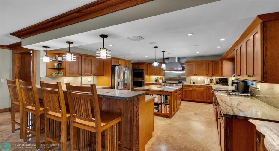Large kitchen crafted with excellent quality cabinets, countertops and appliances