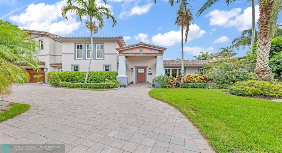 Large craftsman home in a tropical setting