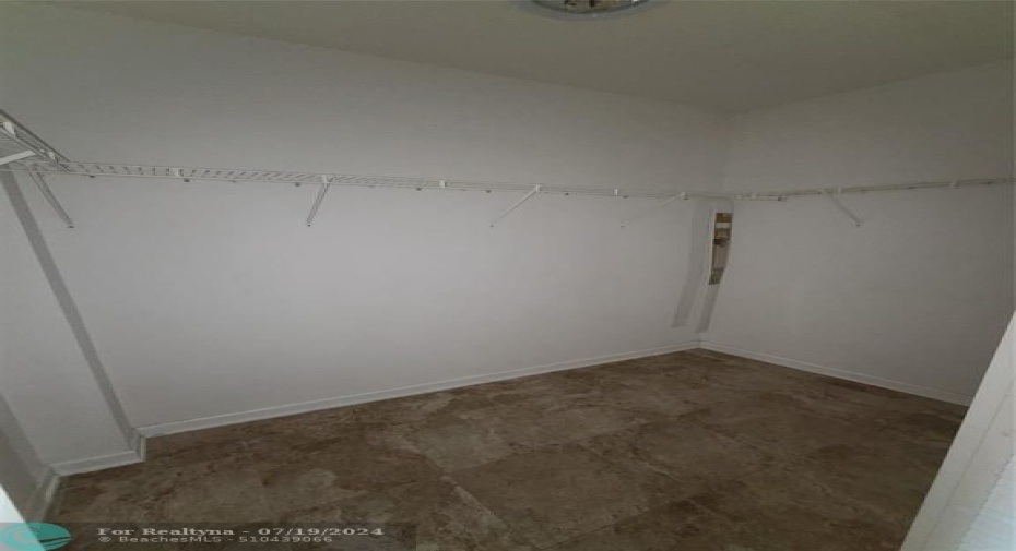 Large walk in closet in guest room