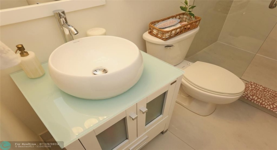guest bathroom with vessel sink